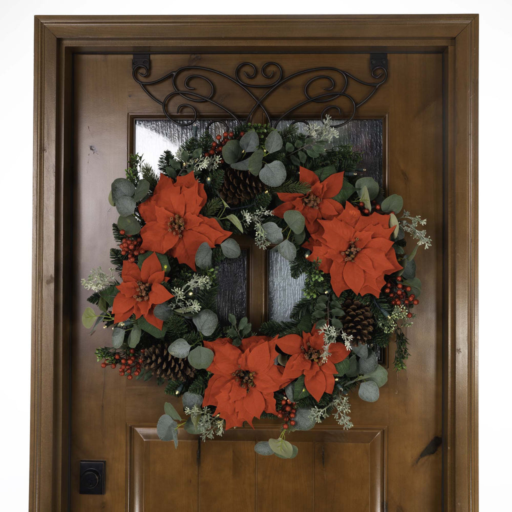 Weihnachts-Poinsettia beleuchtet Weihnachtskranz