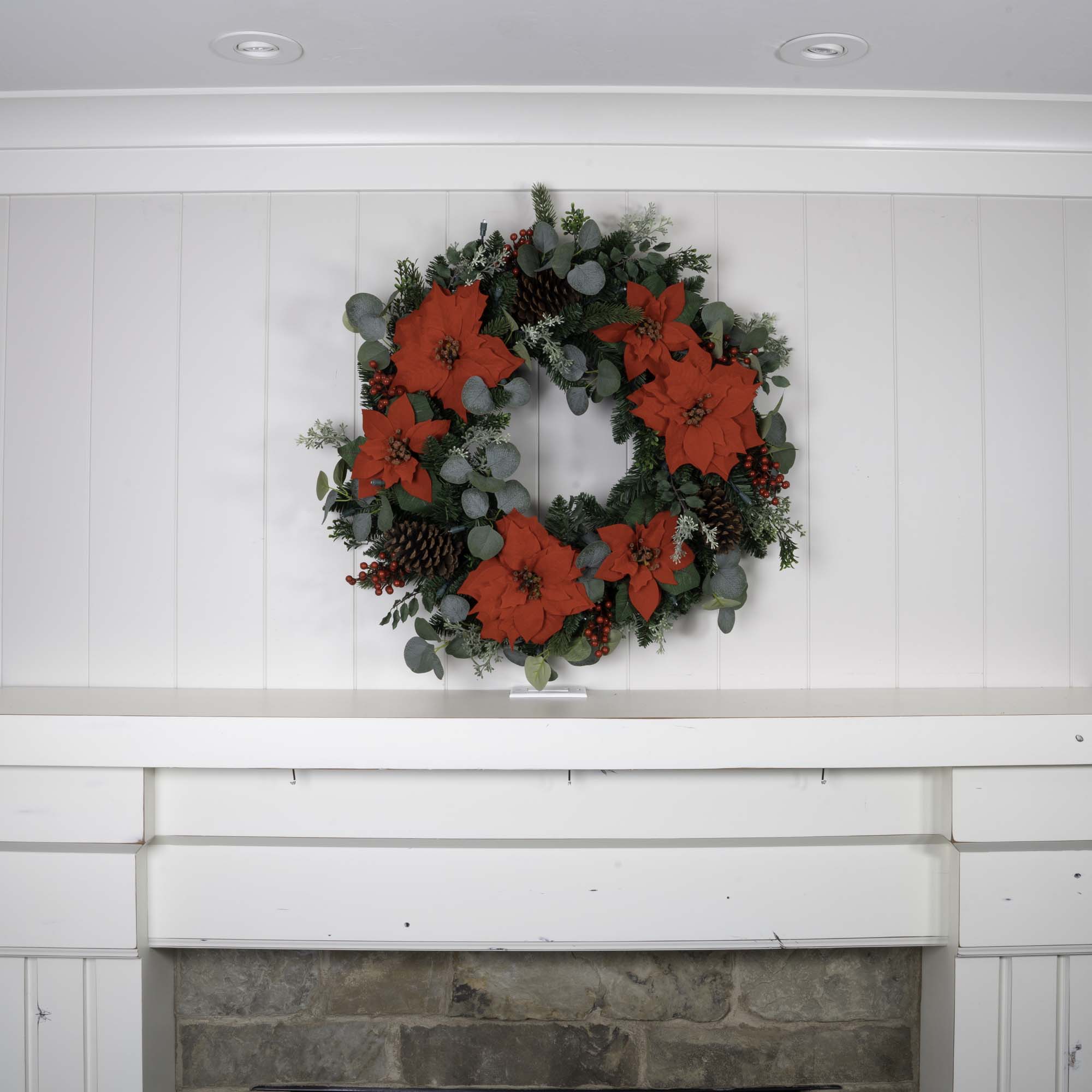 Weihnachts-Poinsettia beleuchtet Weihnachtskranz