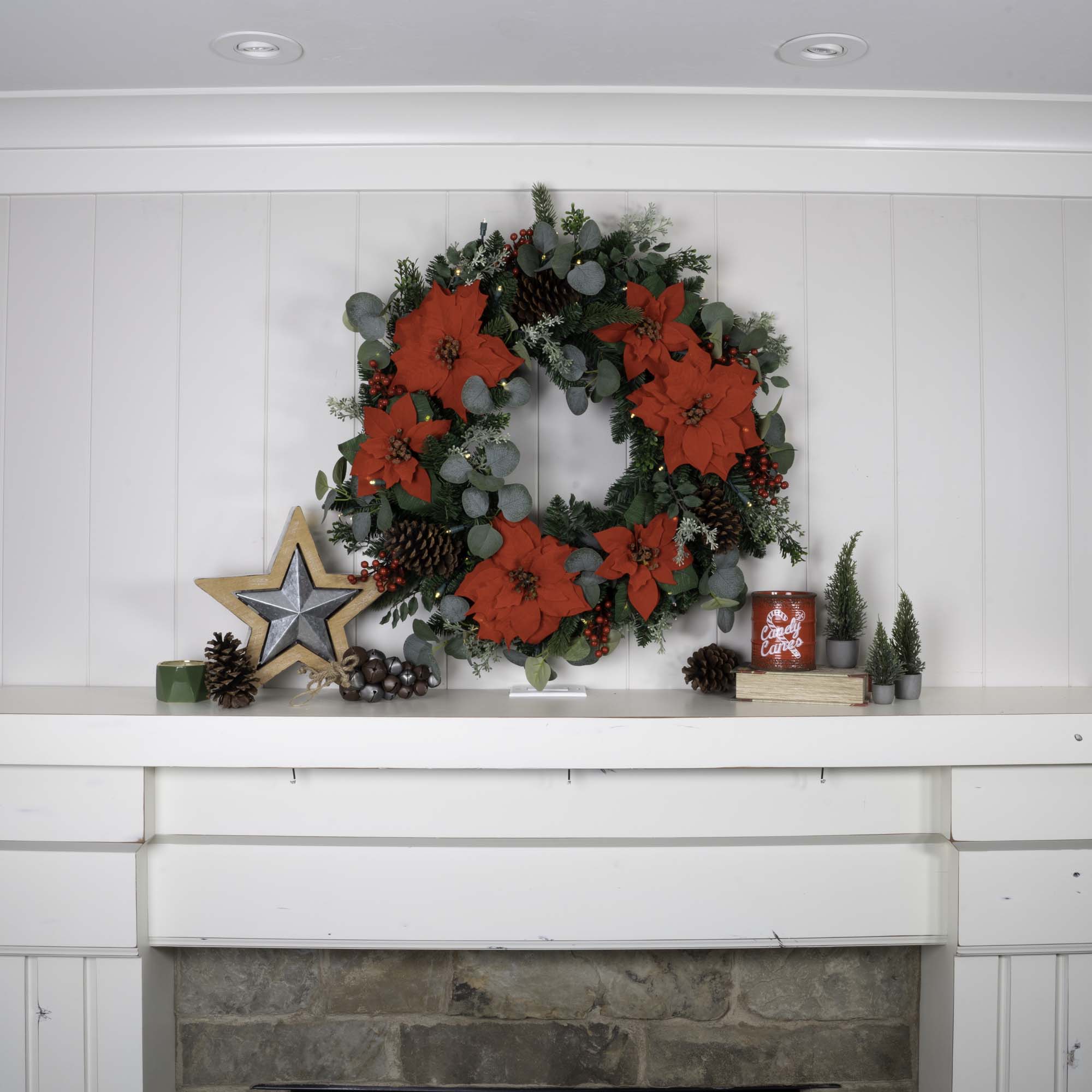 Weihnachts-Poinsettia beleuchtet Weihnachtskranz
